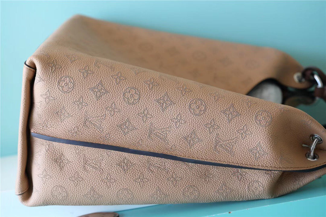 Louis Vuitton Carmel Hobo Bag Mahina Galet  Handbags, Shoulder Bags And Crossbody Bags