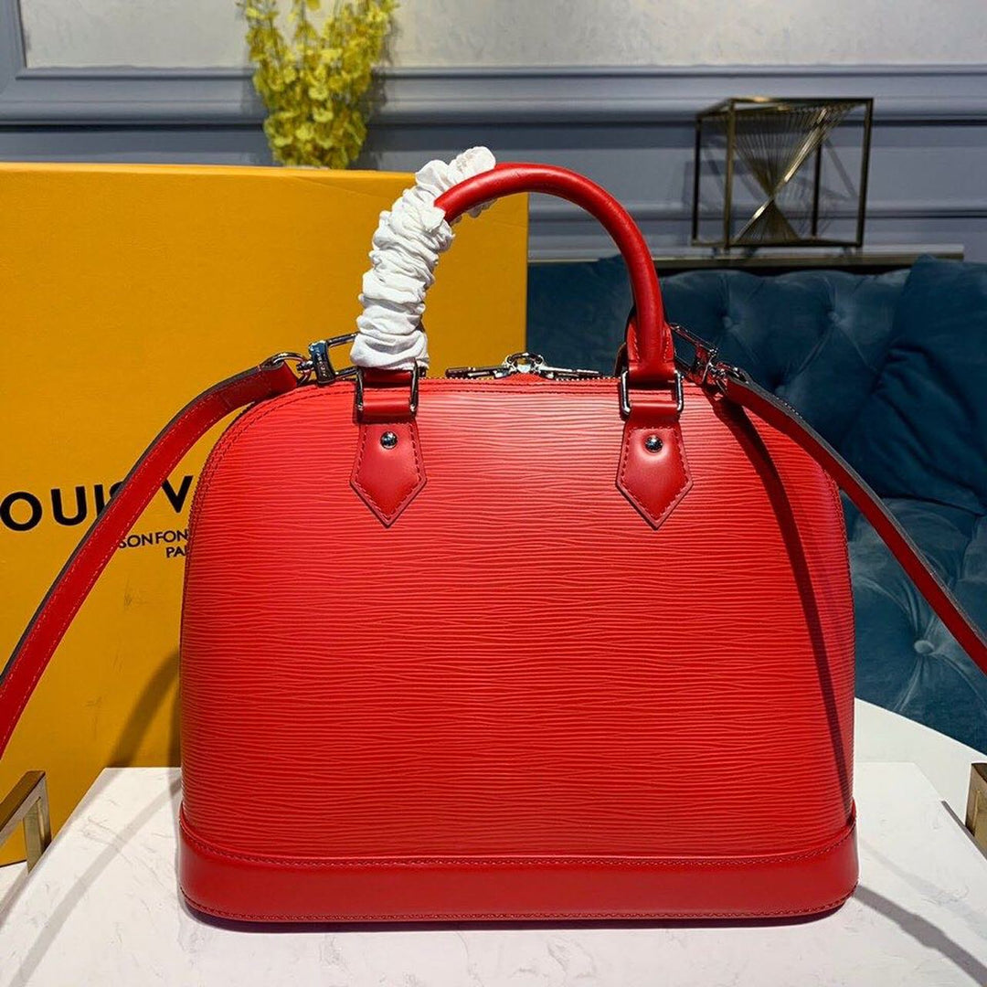 Louis Vuitton Alma PM Epi Red  Handbags, Shoulder And Crossbody Bags