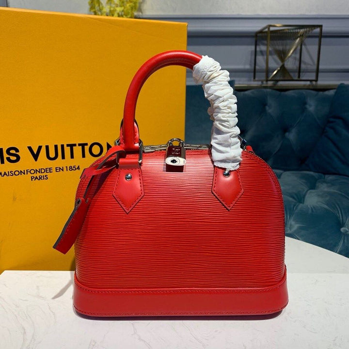 Louis Vuitton Alma BB Epi Coquelicot Red  Handbags, Shoulder And Crossbody Bags