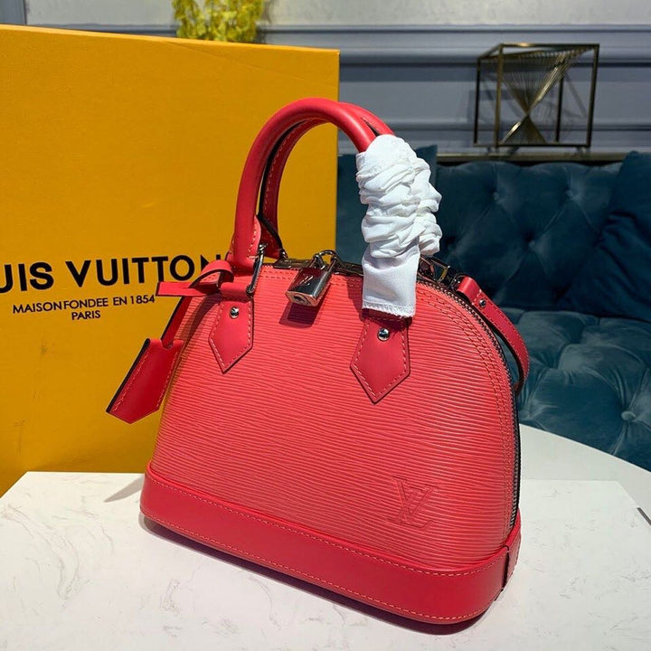 Louis Vuitton Alma BB Epi Hot Pink  Handbags, Shoulder And Crossbody Bags