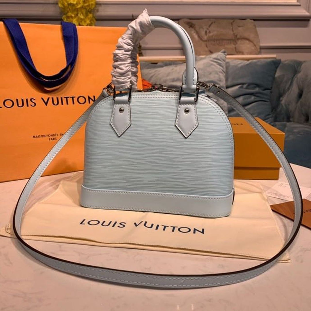 Louis Vuitton Alma BB Epi Seaside Blue  Handbags, Shoulder And Crossbody Bags
