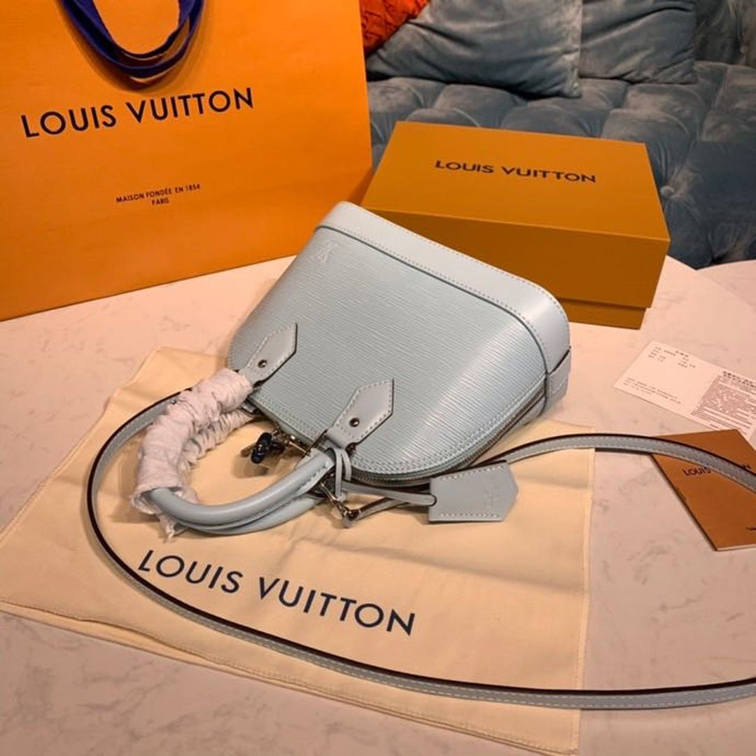 Louis Vuitton Alma BB Epi Seaside Blue  Handbags, Shoulder And Crossbody Bags