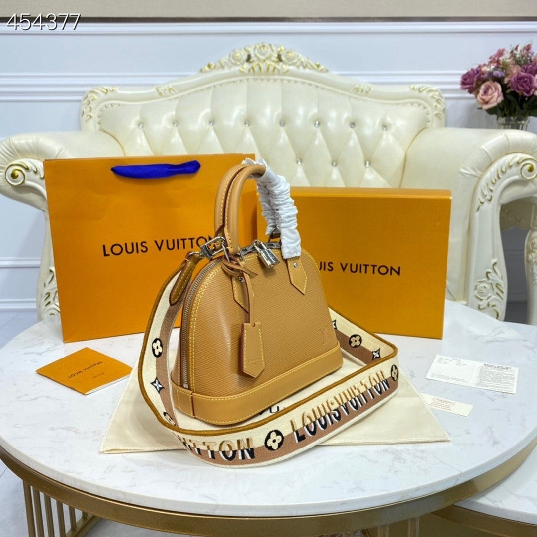 Louis Vuitton Alma BB Sunflower Yellow  Handbags, Shoulder And Crossbody Bags