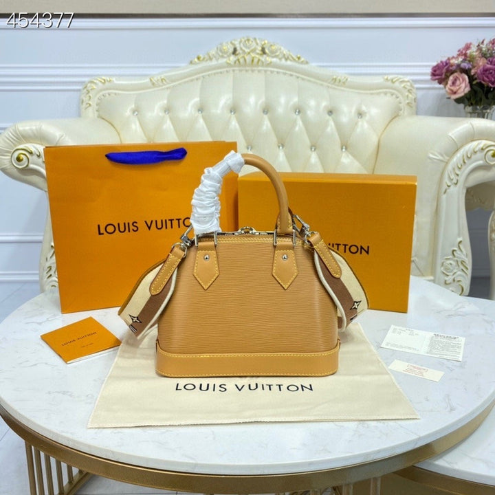 Louis Vuitton Alma BB Sunflower Yellow  Handbags, Shoulder And Crossbody Bags