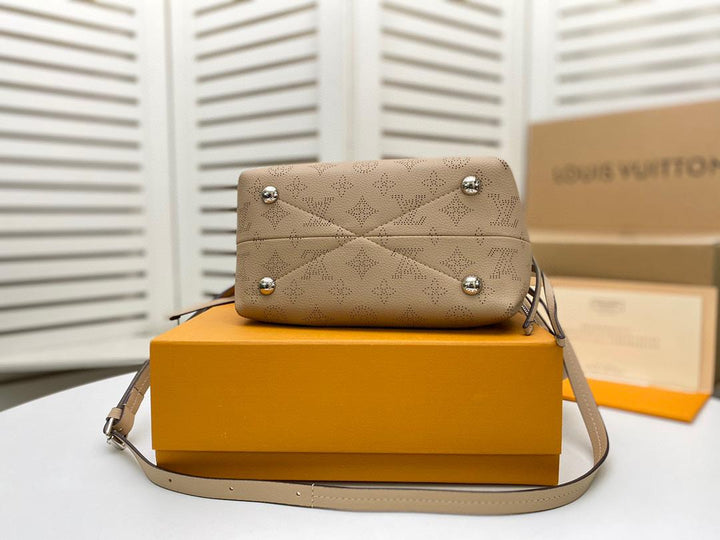 Louis Vuitton Bella Bucket Bag Mahina Galet Grey  Handbags, Shoulder And Crossbody Bags
