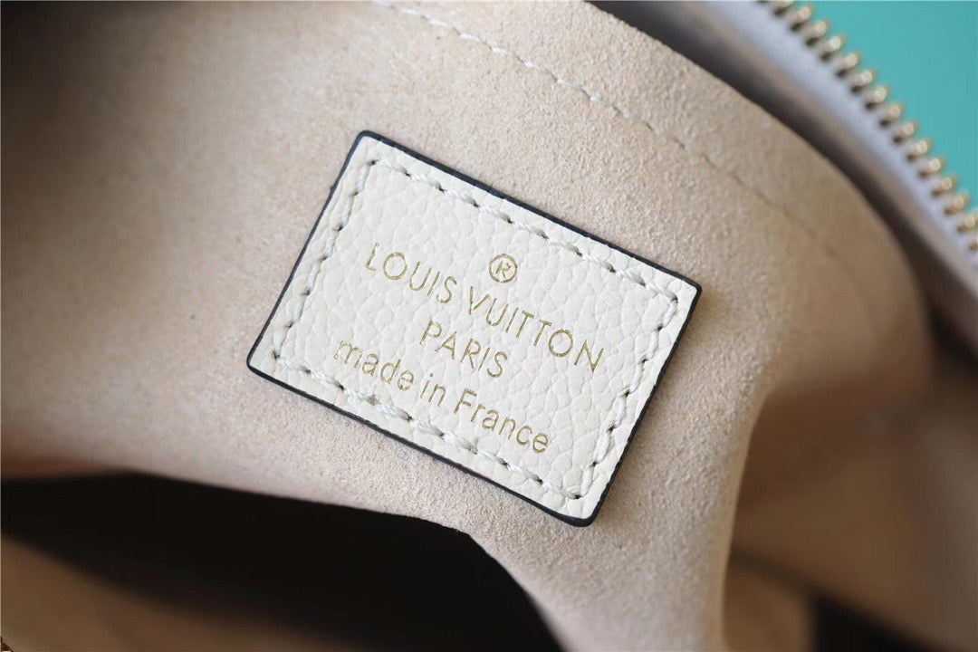 Louis Vuitton Bagatelle Monogram Empreinte Creme Beige  Shoulder And Crossbody Bags