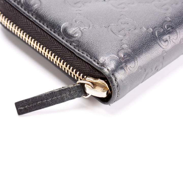 112724 Gucci Canvas Zip Around Wallet