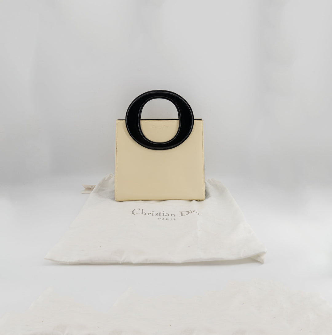 Christian Dior Vintage cream and black handbag with circular handles